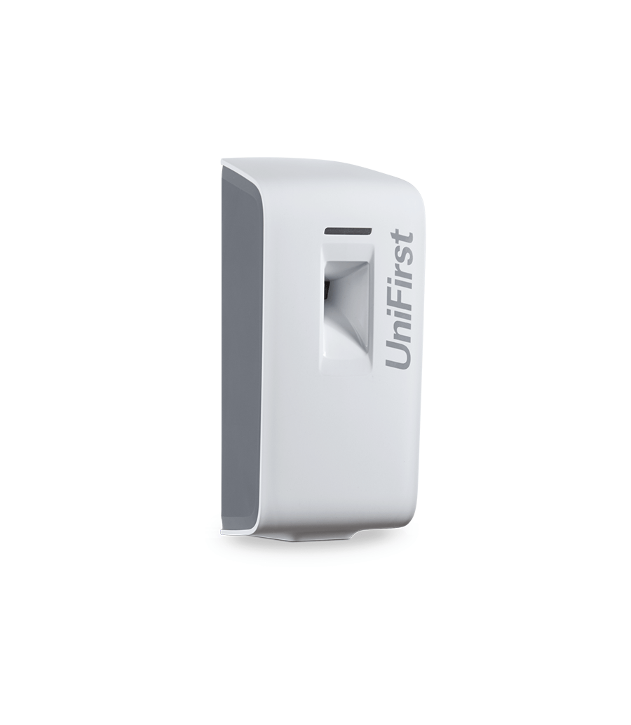 Essential Series metered spray air freshener dispenser pictured in white with a sleek, modern design