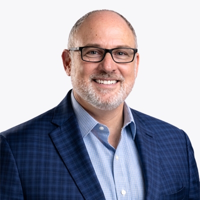 A portrait of David Katz, Executive Vice President of Sales and Marketing for UniFirst Corporation.